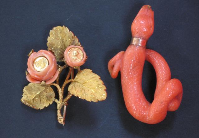 Appraisal: A TH CENTURY PINK CORAL BROOCH carved in the form