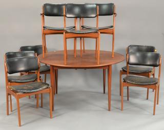 Appraisal: Erik Bach dining table with two leaves and six chairs