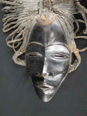 Appraisal: African Carved Wood and Rope Tribal Mask wide long