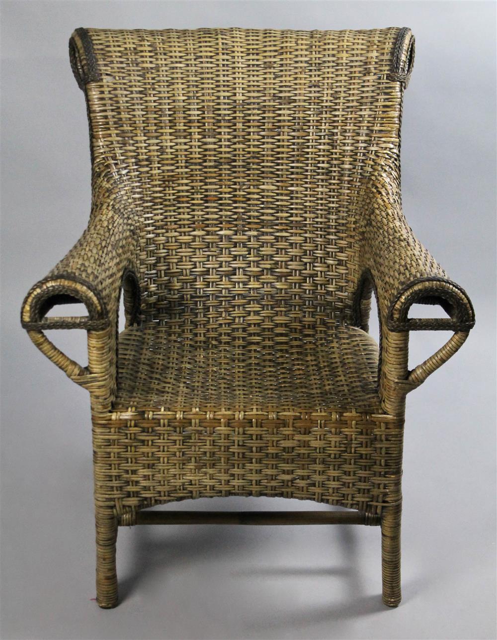 Appraisal: PALACEK STYLE RATTAN WOVEN SCROLLED BACK ARMCHAIR having a rolled