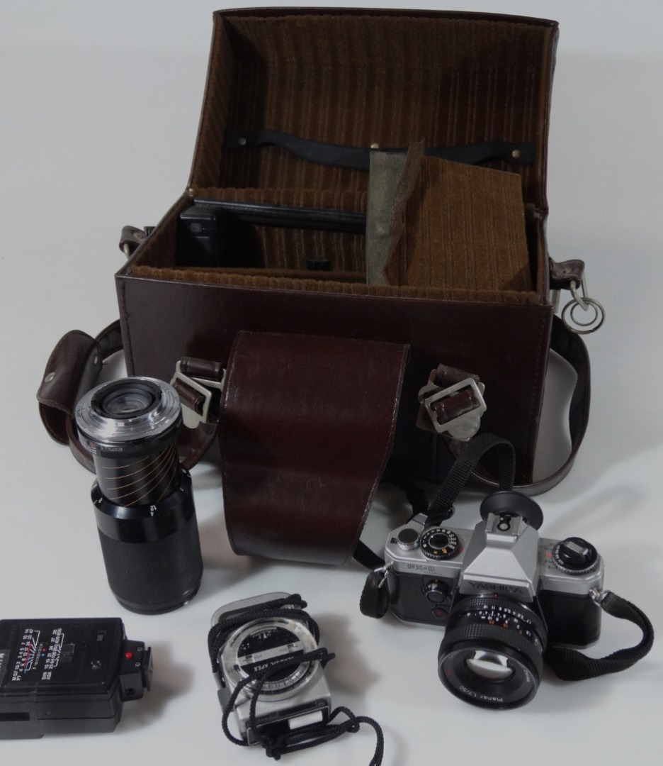 Appraisal: Various cameras and equipment to include a Yashica FX-D camera