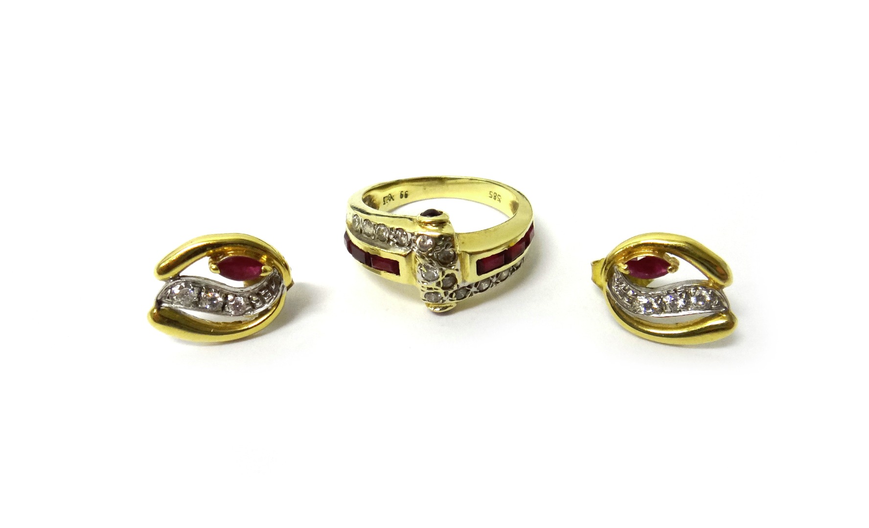 Appraisal: A gold red and colourless gem set ring in a