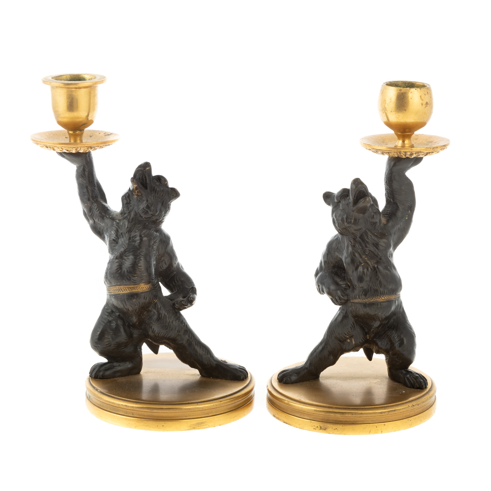 Appraisal: A PAIR OF CONTINENTAL BRONZE FIGURAL CANDLESTICKS th century modeled