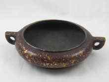 Appraisal: A Chinese bronze ''gold splash'' incense burner cast marks to