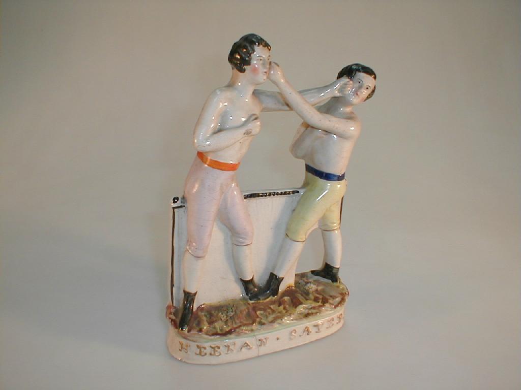 Appraisal: A Staffordshire pottery boxing figure group of Heenam Sayers the