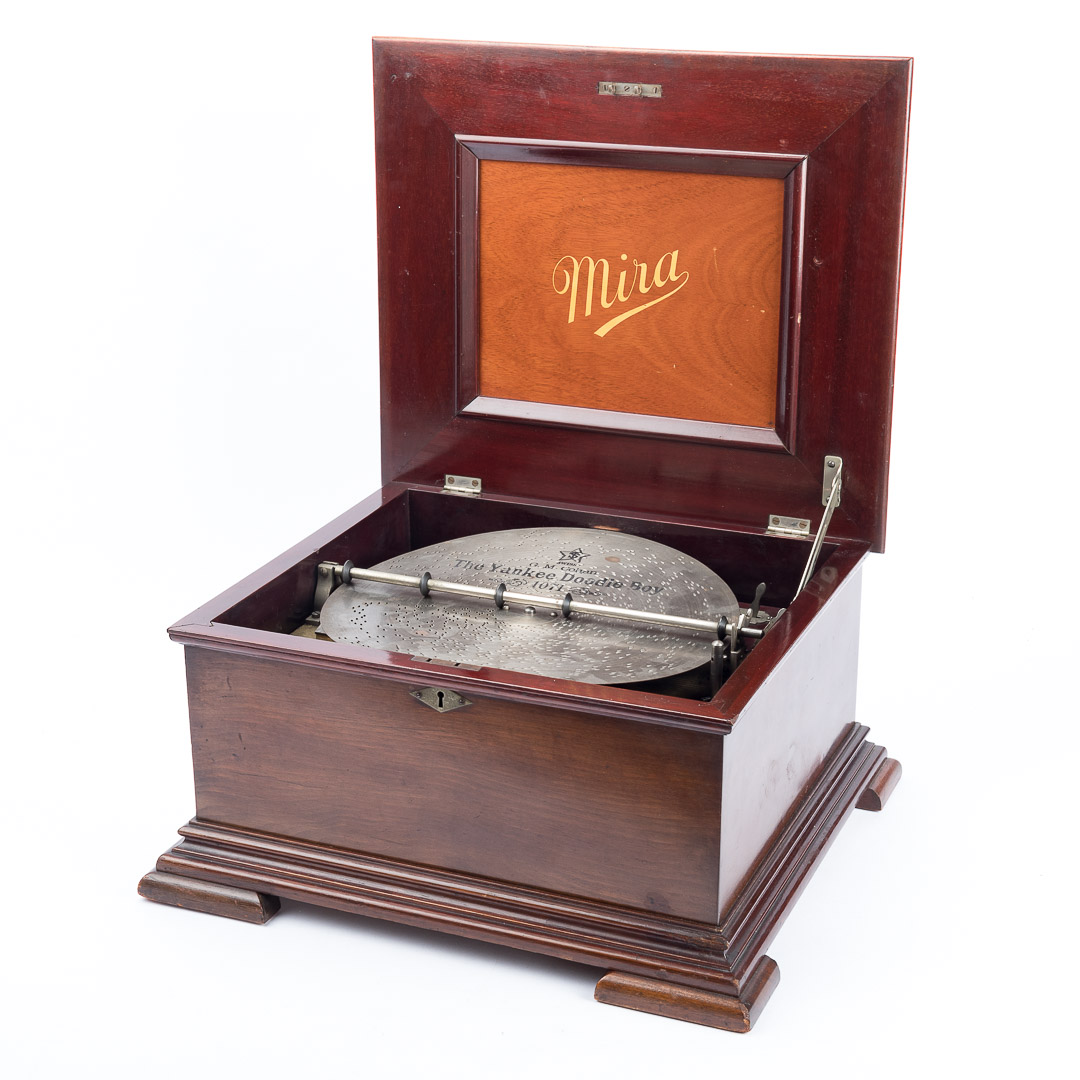 Appraisal: Mira cherrywood disk music box circa single-comb mechanism playing in