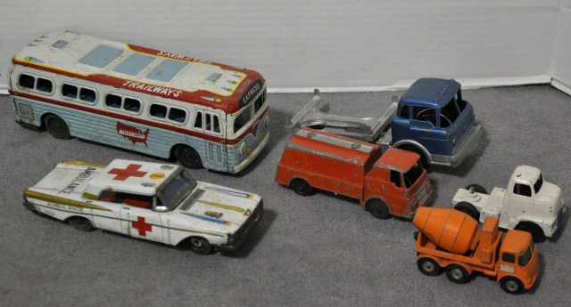 Appraisal: Bx Six Dicast and Tin Trucks Bus