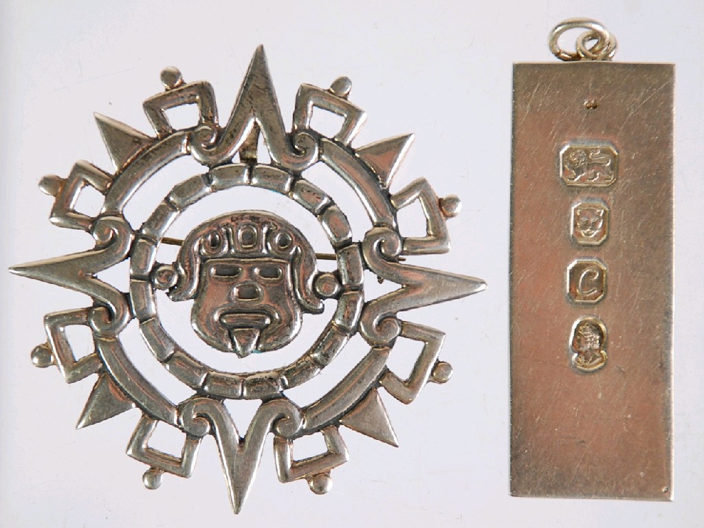 Appraisal: MEXICAN STERLING 'SILVER' PIERCED SILVER STAR PATTERN BROOCH of Aztec