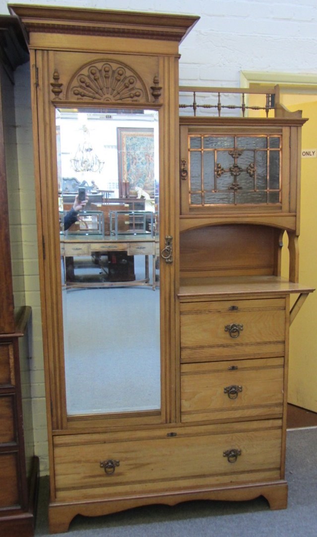 Appraisal: An early th century Shapland Petter compactum wardrobe with bevelled