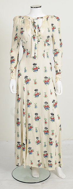 Appraisal: A long cream moss crepe dress by Ossie Clark in