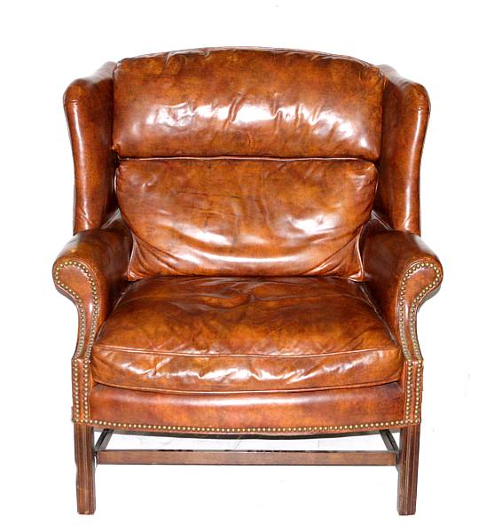 Appraisal: A George III style wingback gentleman's library chair losses height