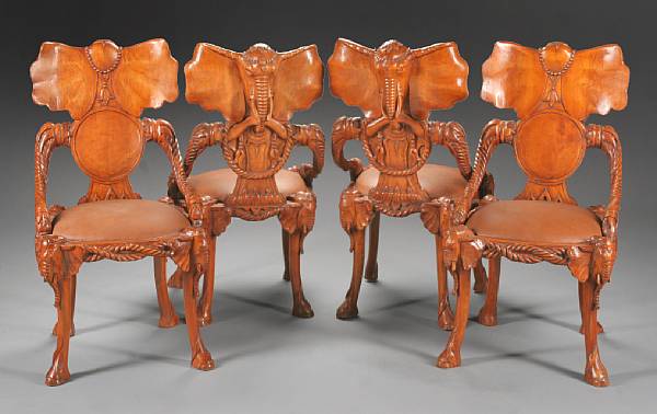 Appraisal: A set of four Continental carved wood elephant chairs Each