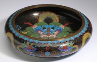 Appraisal: Chinese cloisonn dragon low bowl dia Chinese cloisonn dragon low