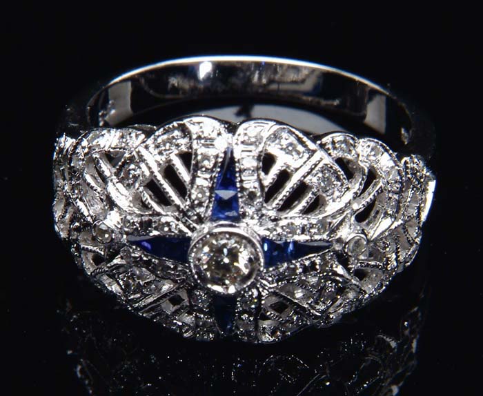 Appraisal: DIAMOND SAPPHIRE RING Nice filigree ring is kt white gold