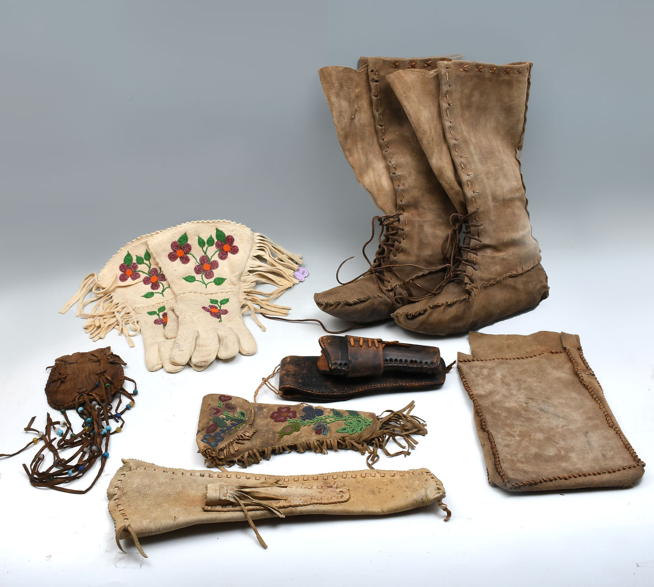 Appraisal: MISC LOT OF AMERICAN INDIAN ITEMS Buckskin lace up boots