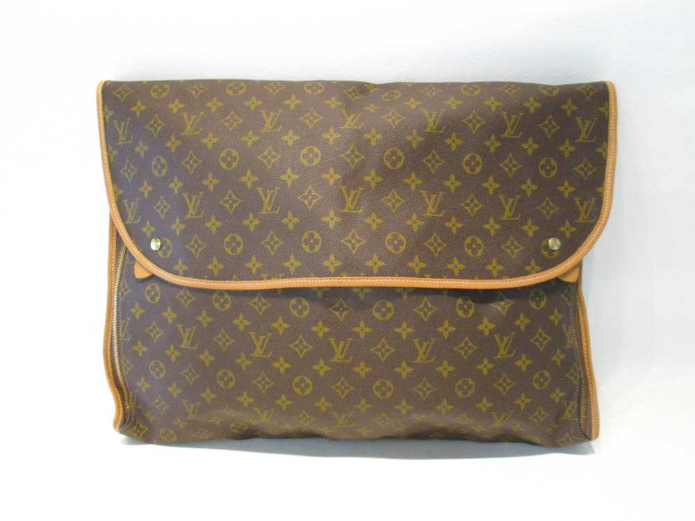 Appraisal: TWO LOUIS VUITTON STYLE LUGGAGE INSERTS with zipper and snap