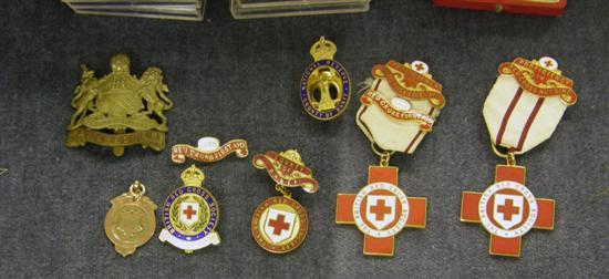 Appraisal: A GOLD MEDALLION ct quanttity of Red Cross enamelled badges