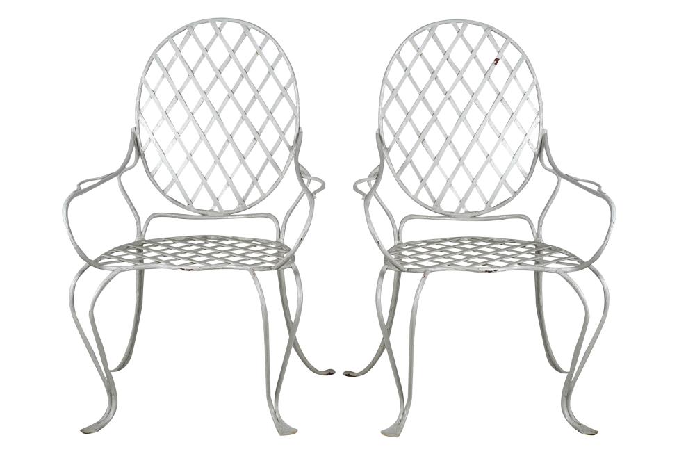 Appraisal: PAIR OF WHITE IRON PATIO CHAIRSwith scrolled arms and woven