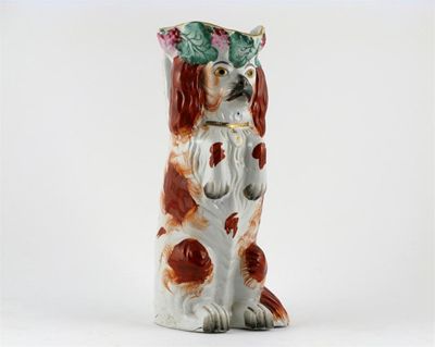 Appraisal: A Staffordshire jug modelled as a King Charles spaniel standing