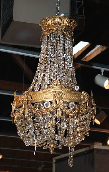 Appraisal: A Neoclassical style gilt bronze and cut glass four light