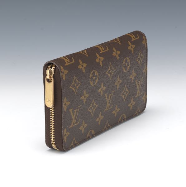 Appraisal: LOUIS VUITTON MONOGRAM ZIPPY WALLET x x Monogram body gold-tone