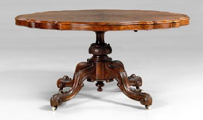 Appraisal: Victorian burlwood breakfast table cartouche-form burlwood veneered top tilting over