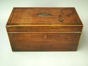 Appraisal: A George III mahogany tea caddy with crossbanded decoration containing