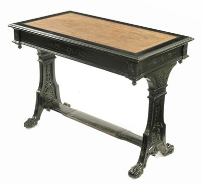 Appraisal: A Victorian ebonised writing table in Grecian revival style the