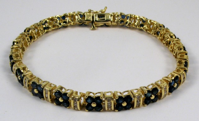 Appraisal: SAPPHIRE AND DIAMOND BRACELET k yellow gold and set with