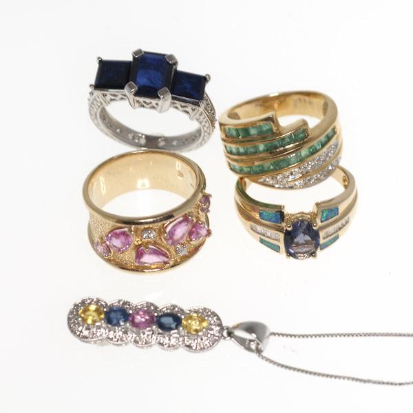 Appraisal: CONTEMPORARY GEM-SET JEWELRY Four rings and a pendant k and