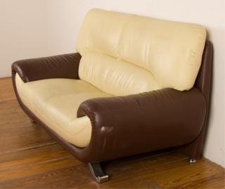 Appraisal: Leather Two Leather loveseat beige with brown frame curved design