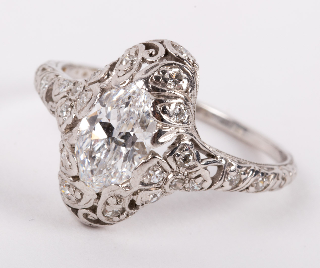 Appraisal: A ct Oval Diamond Ring platinum and filigree ring contains