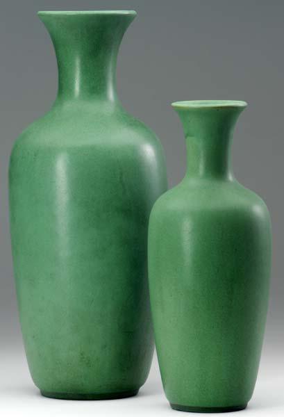 Appraisal: TECO Two tall vases covered in smooth matte green glaze