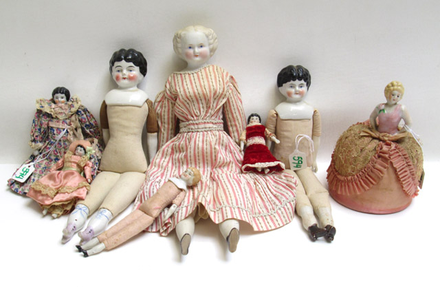 Appraisal: EIGHT PORCELAIN AND BISQUE HEAD DOLLS including half doll Some