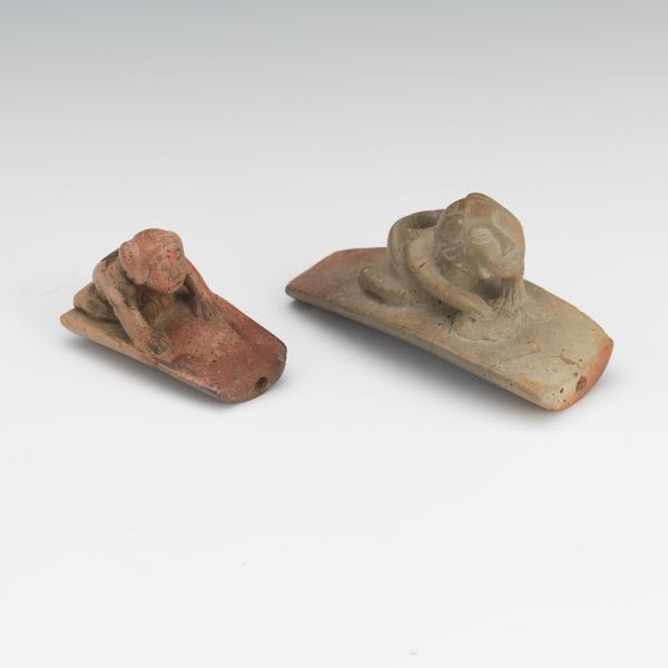 Appraisal: TWO CARVED EFFIGY PIPES OF HUMANS Larger pipe of a