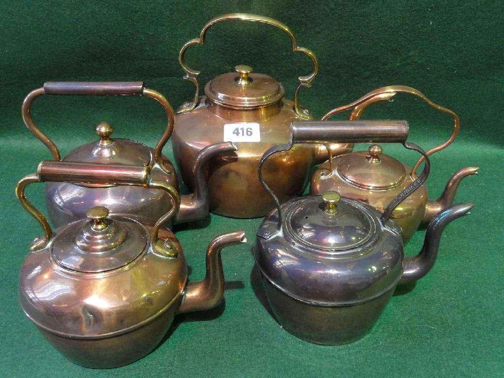 Appraisal: A collection of six small th century copper kettles