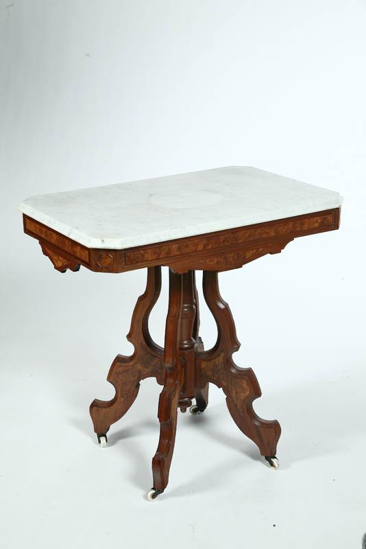 Appraisal: MARBLE TOP VICTORIAN STAND White rectangular top on a walnut