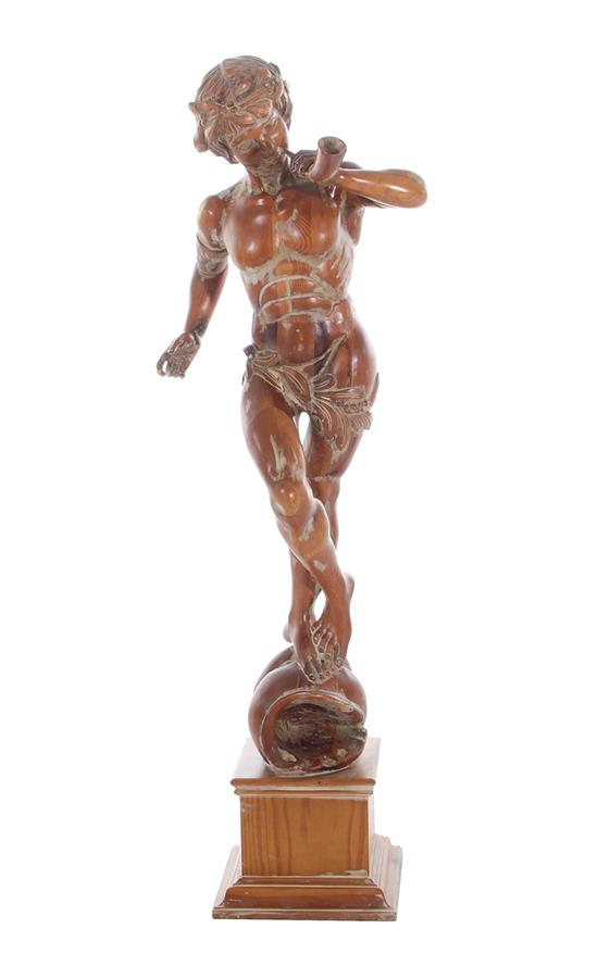 Appraisal: Italian carved pine figure Triton standing on shell H W