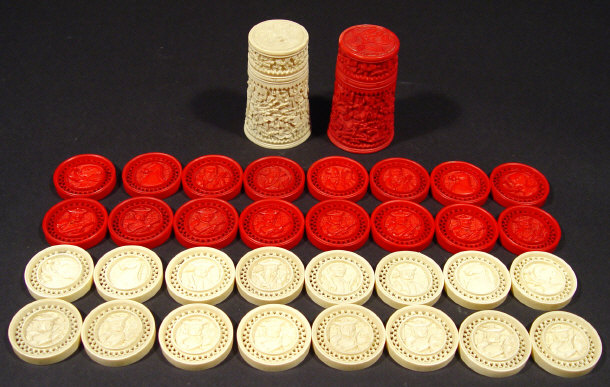 Appraisal: Collection of plain and red stained ivory draughtsmen together with