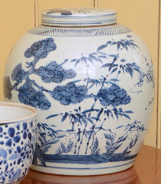 Appraisal: A CHINESE GINGER JAR AND COVER decorated with pine trees