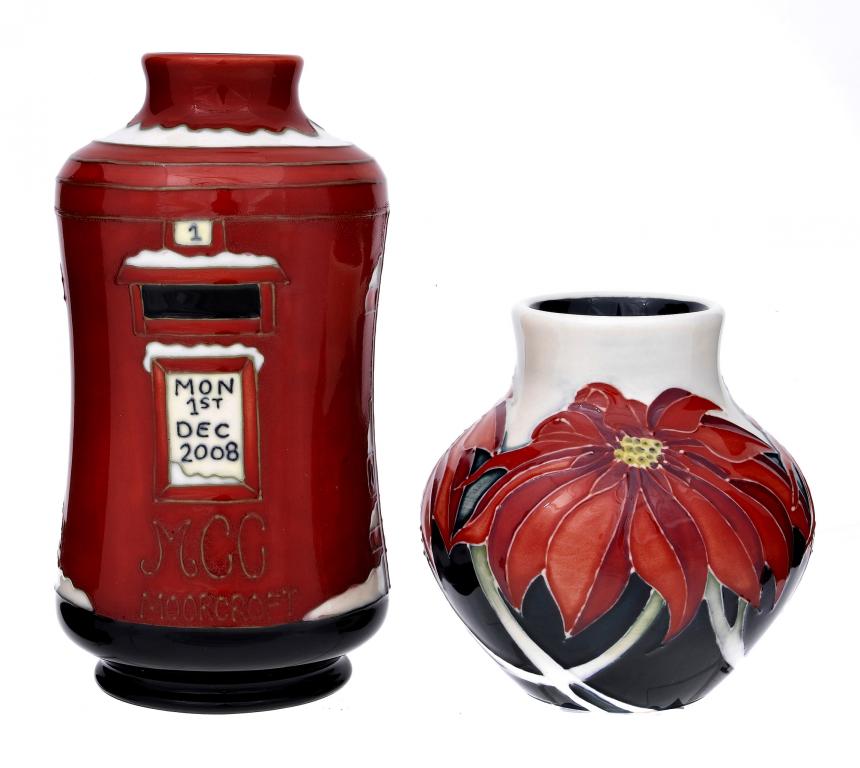 Appraisal: A MOORCROFT CHRISTMAS SCARLETT VASE AND A MOORCROFT CHRISTMAS POSTBOX