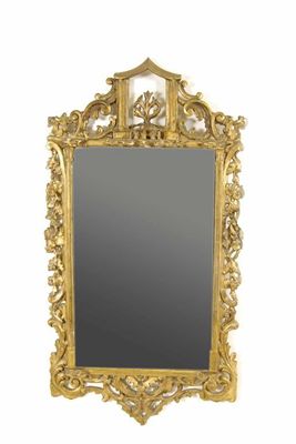 Appraisal: An Irish giltwood and gesso wall mirror the rectangular plate