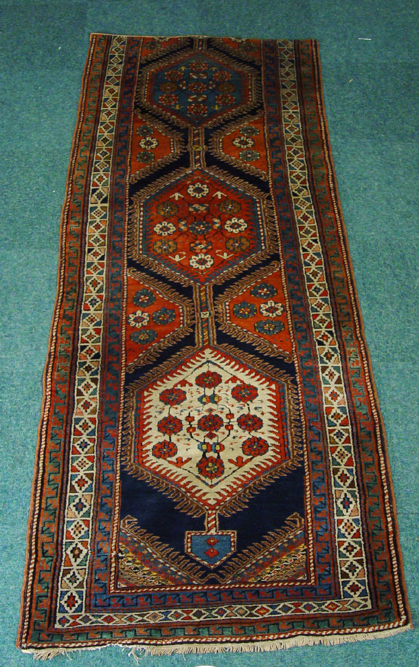 Appraisal: Two piece carpet runner with multi coloured floral stitching