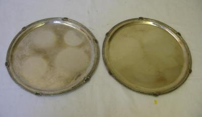 Appraisal: A PAIR OF CONTINENTAL SALVERS of circular form the gadrooned