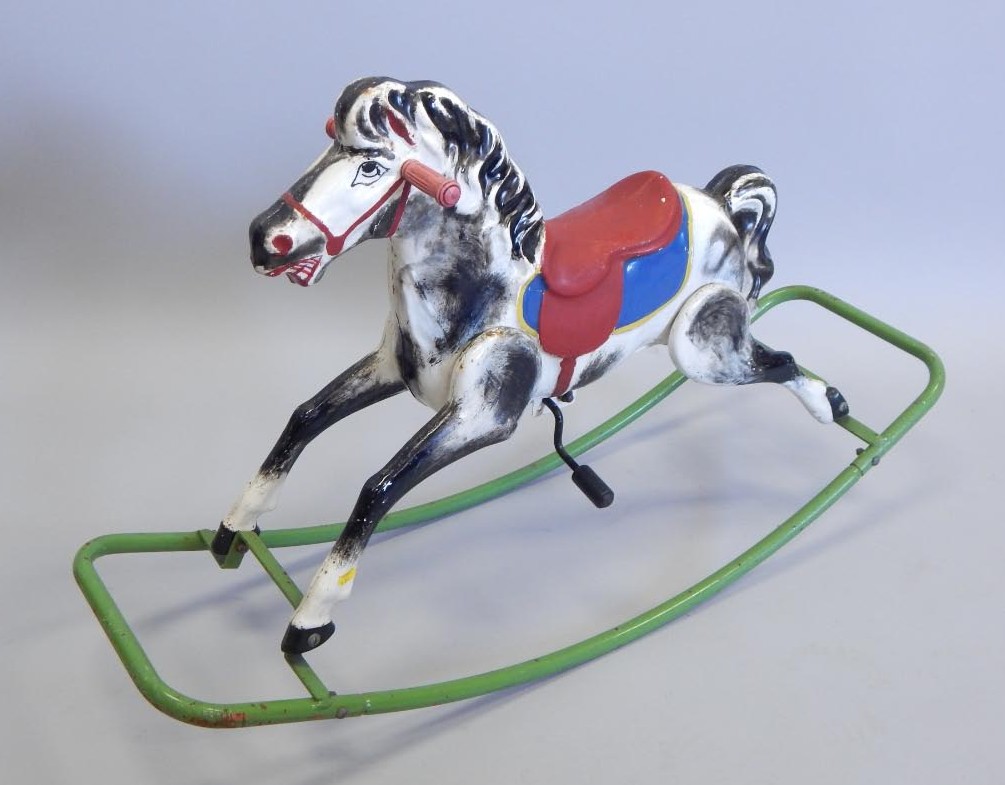 Appraisal: A mid thC metal rocking horse on later runners