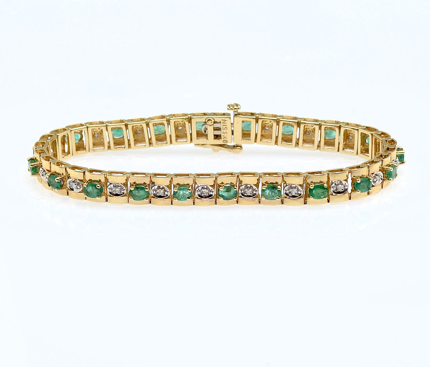 Appraisal: K EMERALD DIAMOND BRACELET K yellow gold bracelet contains round