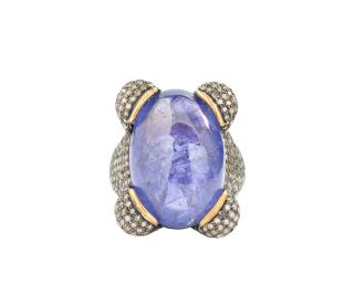 Appraisal: A TANZANITE AND DIAMOND RING A TANZANITE AND DIAMOND RING