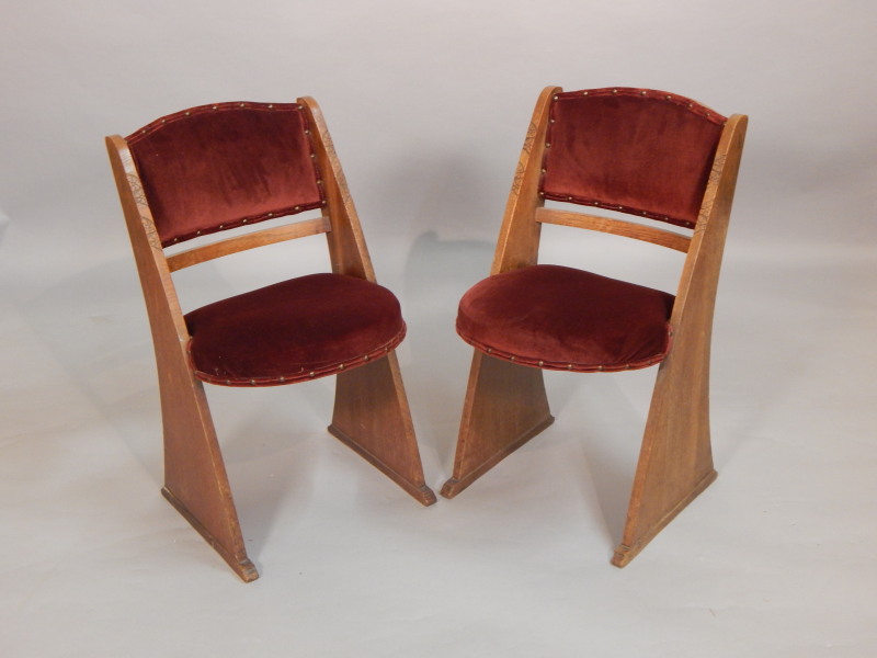 Appraisal: A pair of Art Deco oak cinema type chairs each