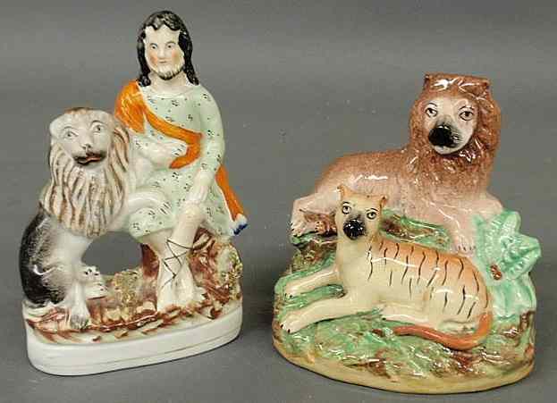 Appraisal: Two Staffordshire figural groups- Lion Tamer h and Lion and