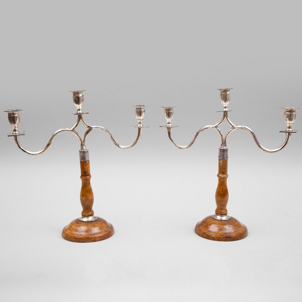 Appraisal: Pair of Silver Plate Three-Light Candelabras on Turned Wood Bases